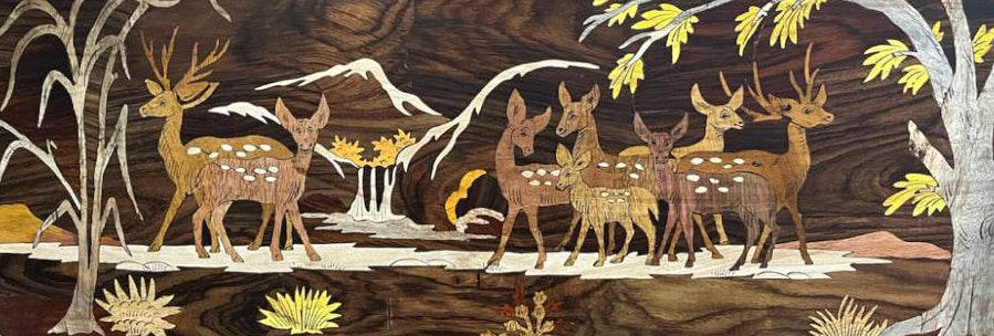 Mysore inlay art depicting spotted deer in a forest